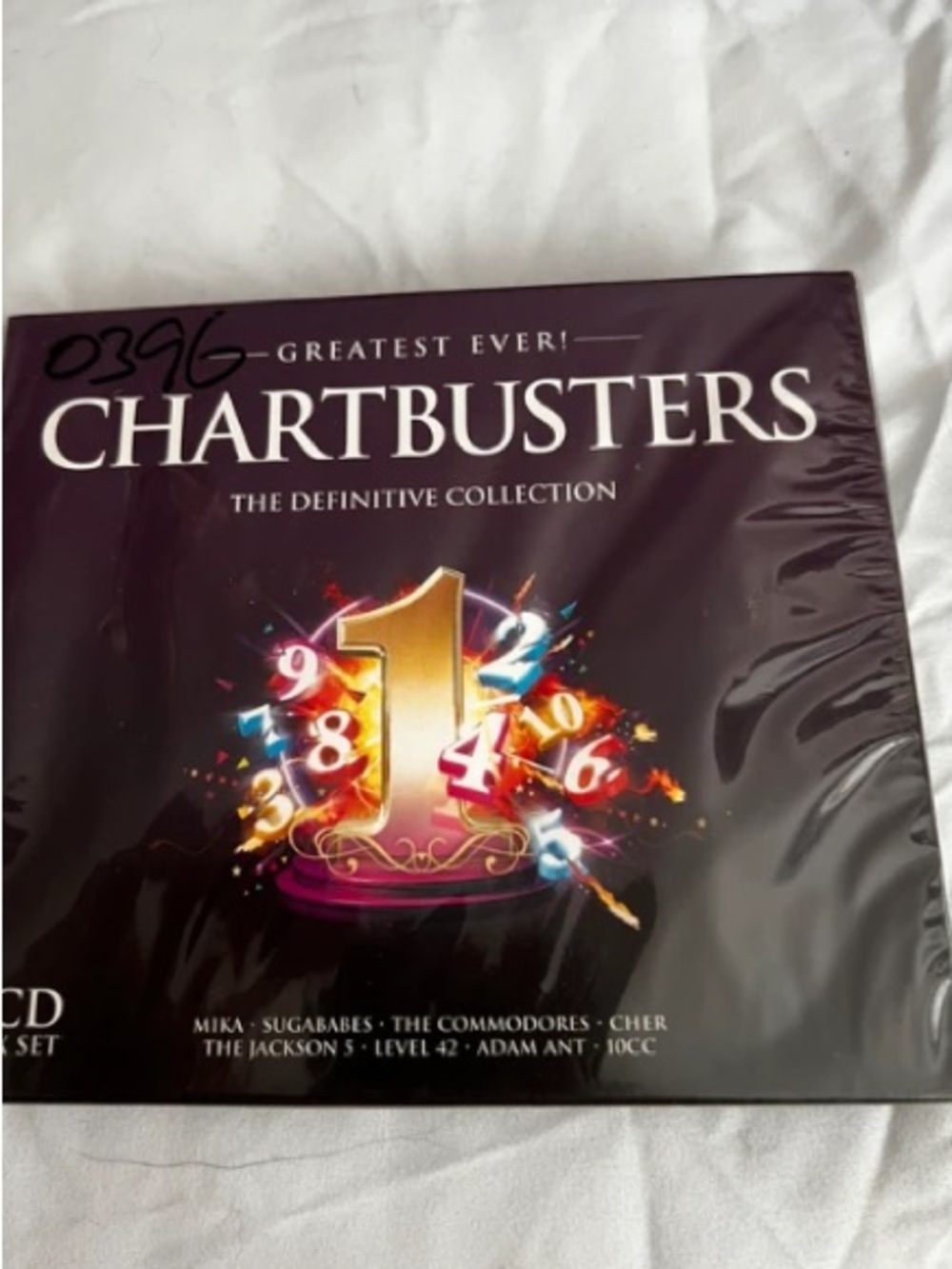 Chartbusters: The Definitive Collection - Purple Cover